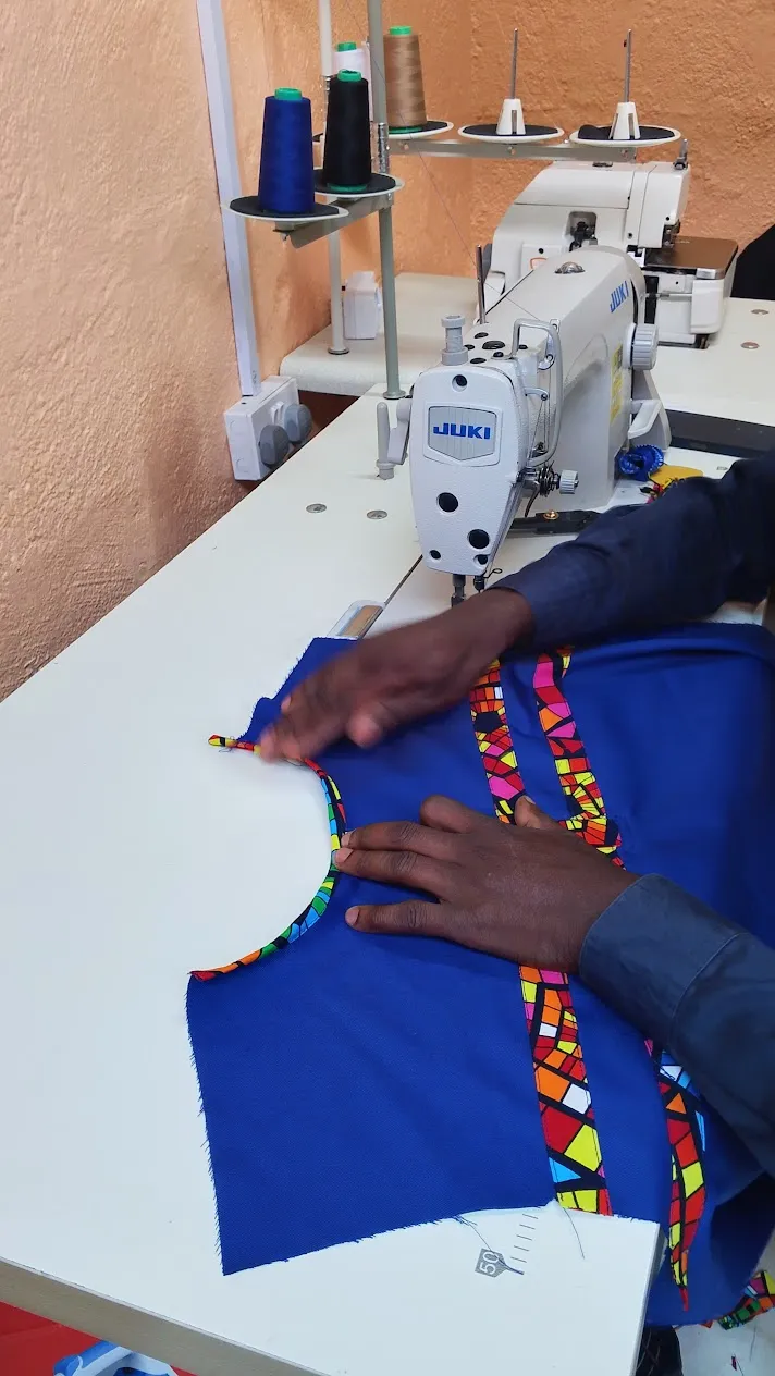 Tailor Sewing Blue Kitenge Shirt